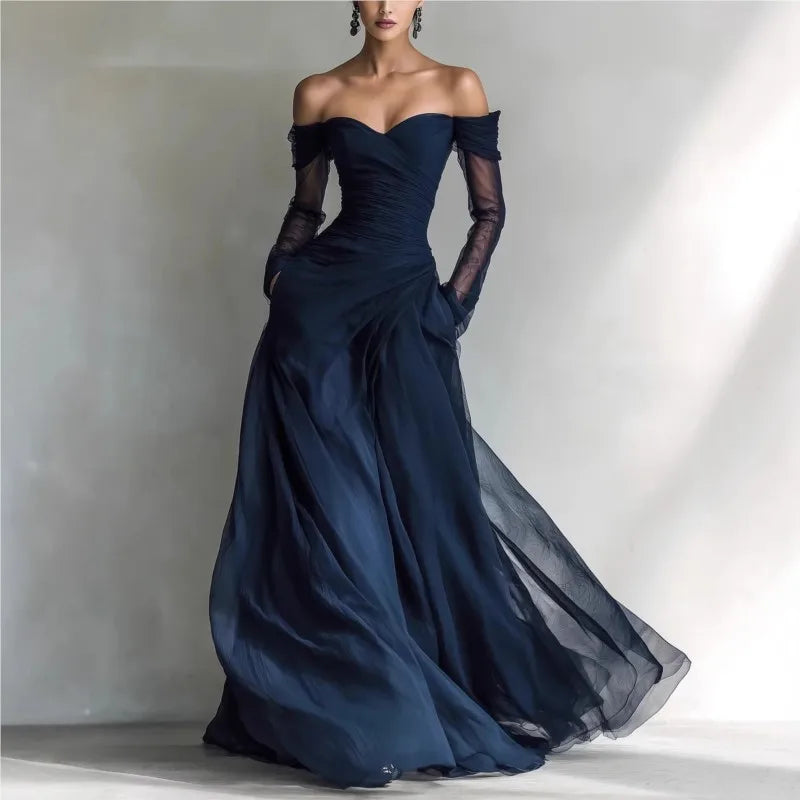Eleonora | Vestido largo con hombros al descubierto e inserciones de malla