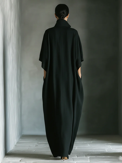 Alessandra | Vestido largo negro oversize minimalista con mangas de kimono