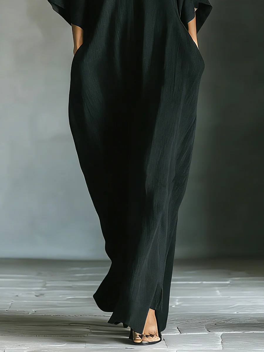 Alessandra | Vestido largo negro oversize minimalista con mangas de kimono
