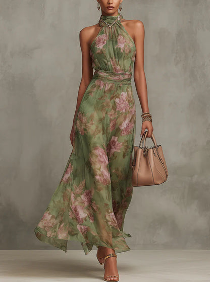 Serena - Vestido largo de gasa verde con estampado floral y escote halter.