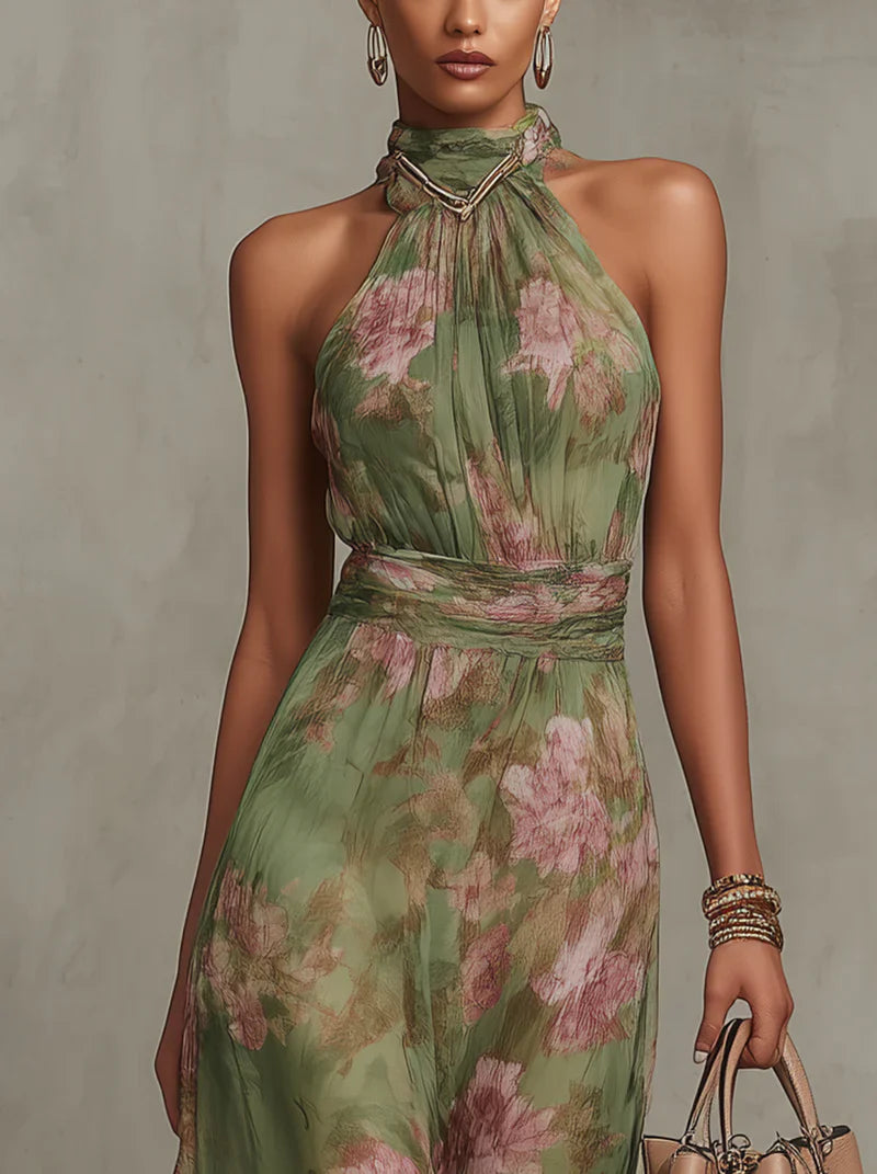 Serena - Vestido largo de gasa verde con estampado floral y escote halter.